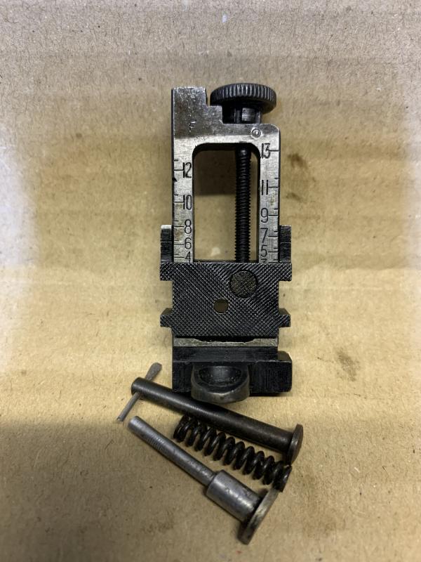 LEE ENFIELD No4 MK1 SINGER TYPE MILLED REAR SIGHT. GOOD WORKING ORDER WITH GOOD CLICKS .